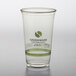 A Fabri-Kal Greenware clear plastic cup with a logo on it.