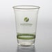 A clear plastic Fabri-Kal Greenware cup with a green logo.