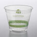 A clear plastic Fabri-Kal Greenware cup with a green label.