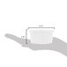 A hand holding a white fluted ramekin with measurements.