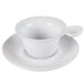 A Bright white CAC porcelain cup and saucer with a spoon.