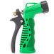 A close-up of a green and black insulated spray nozzle.