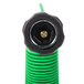 A close-up of a green and black Notrax insulated spray nozzle on a hose.