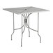 A Lancaster Table & Seating Harbor Gray square metal outdoor table with ornate legs.