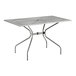 A Lancaster Table & Seating rectangular outdoor table with a metal top and modern legs.