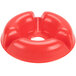 A red plastic bowl with a hole in the middle.