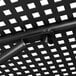The metal structure of a Lancaster Table & Seating Harbor Black outdoor table with a bolt.