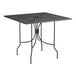 A Lancaster Table & Seating Harbor black wrought iron table with a square top.