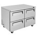 A stainless steel Turbo Air undercounter refrigerator with four drawers.