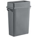 A grey plastic Lavex trash can with a lid.