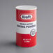 A red and white Kraft canister of double-acting baking powder.