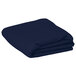 A folded navy blue Intedge rectangular cloth table cover.