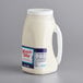 A white jug of Kraft Miracle Whip dressing with a label and a handle.