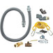 A Dormont ReliaGuard gas connector hose kit with a grey hose, yellow fittings, and other parts.