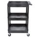 A black plastic Luxor utility cart with three shelves and wheels.