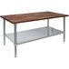 A wood work table with a galvanized metal base and adjustable metal undershelf.