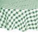 A green and white checkered Intedge vinyl table cover on a table.
