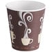 A Dart ThermoGuard paper hot cup with white coffee and swirl designs.