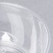 A clear plastic bowl with a white background.