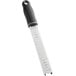 A Choice stainless steel handheld shaver with a black handle and white blade.