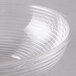 A clear Cambro Camwear round ribbed bowl.