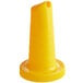 A yellow cone with a white top and a hole.