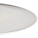 An American Metalcraft silver aluminum pizza pan with a white background.