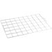 A wire grid with squares for sheet cake on a white background.