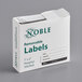 A white box of Noble removable hospital labels with green text.