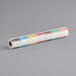 A roll of white paper with colorful Noble Products Wednesday dissolvable labels.