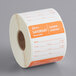 A roll of white paper labels that say "Saturday" with orange and white text.