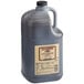 A large jug of Lea & Perrins Worcestershire Sauce.