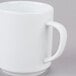 An Arcoroc white porcelain mug with a handle.