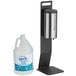 A Lavex stainless steel foaming sanitizing station on a counter with a liquid dispenser.
