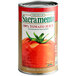 A Sacramento 46 fl. oz. tomato juice can with a label.
