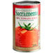 A Sacramento 46 fl. oz. can of tomato juice.
