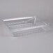 A Carlisle clear plastic food box deep drain tray with a plastic handle and holes.