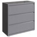 A Hirsh Industries Arctic Silver metal lateral file cabinet with three drawers.