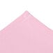 A folded light pink Intedge chef neckerchief with white stitching.