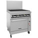 A large stainless steel Vulcan gas charbroiler and convection oven.