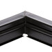 A black corner piece with two black strips on a True 810784 Equivalent Magnetic Door Gasket.