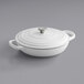 A Valor Arctic White enameled cast iron brazier/casserole dish with a lid.