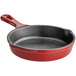 A Valor cranberry enameled cast iron skillet with a handle.