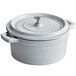 A white Valor enameled cast iron pot with a lid and handle.