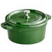 A Valor fern green enameled cast iron pot with lid.