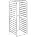 An unassembled white metal sheet pan rack with shelves.