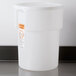 A white Carlisle food storage container lid.