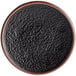 An Acopa Heika black matte stoneware plate with a brown rim.