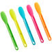 A group of colorful sandwich spreaders with neon handles.