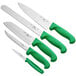 A group of four Choice knives with green handles.